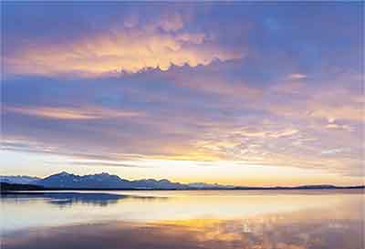 Soft sunrise colors over water. Nature's sunrises can be awesome.