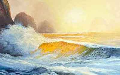 Sunset colors show through the eye of an ocean wave. Sunset and sunrise colors are reflected on the ocean.