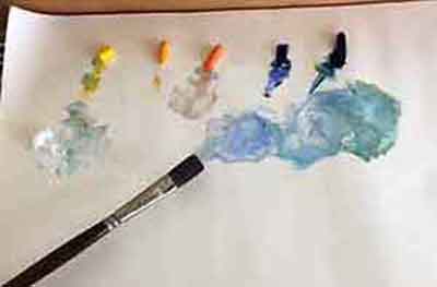 I laid out my colors plus white on a
disposable paper palette.