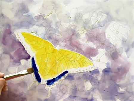 Underpaint the butterfly right over the vein lines. Step two of painting a watercolor butterfly, under-paint the butterfly