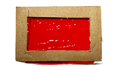red cellophane in a cardboard frame My homemade value viewer made with red cellophane.